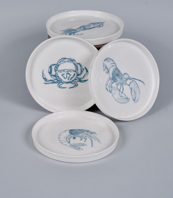 4 Petites assiettes "Océan", porcelaine et décor sérigraphié